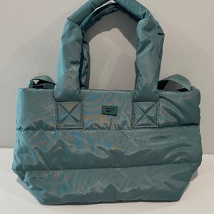 NWT Reebok Amber  Trellis Crossbody with Adjustable Crossbody strap.